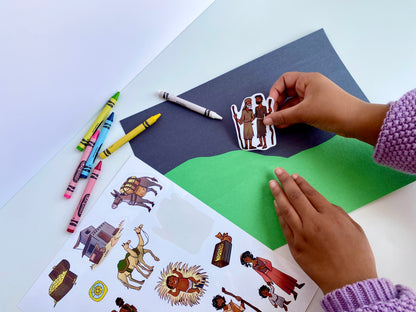 Child placing stickers on paper to retell the nativity story